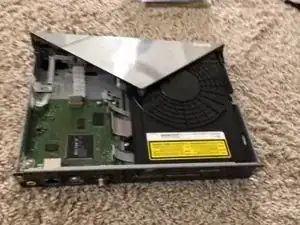 Remove the clasps on the bottom of the device.