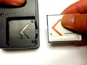 How to charge Canon PowerShot A4000 IS battery