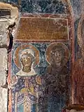 St Nicholas - fresco of St Barbara and St Anastasia and the painted inscription