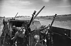 The DShK anti-aircraft machine guns mounted on the Soviet armoured train Zhelezniakov, May 1942