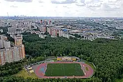 The sports stadium at Studyony Passage and Medvedkovsky forest park.