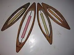 Macedonian open shuttles with paper quills.