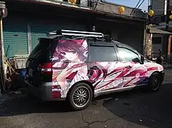 An itasha in Taiwan with Reimu Hakurei from Touhou Project on a Mitsubishi Savrin