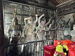 Liao dynasty (916-1125) statutes of four of the Eight Wisdom Kings and an attendant warrior at Datong Guanyin-tang[zh], Datong, Shanxi, China. From left to right: Padanakṣipa, Acala, Yamāntaka, Aparājita