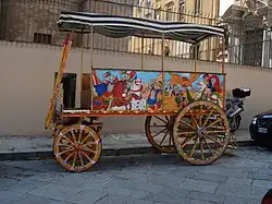 A four-wheeled horse-drawn sight-seeing carretto for tourists