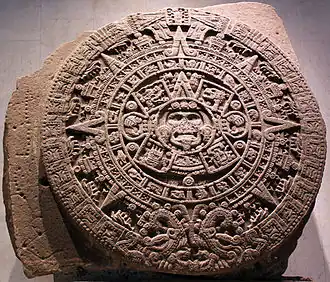 Aztec calendar stone; 1502–1521; basalt; diameter: 358 cm (141 in.); thick: 98 cm (39 in.); discovered on 17 December 1790 during repairs on the Mexico City Cathedral; National Museum of Anthropology (Mexico City). The exact purpose and meaning of the Calendar Stone are unclear. Archaeologists and historians have proposed numerous theories, and it is likely that there are several aspects to its interpretation[49]