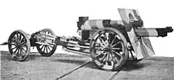 US Model 1918 attached to limber with barrel pulled back in traveling position