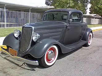 1934 Model 40B or B three window coupe, built in the 1950s hot rod tradition with 1930s style steel wheels and rows of hood louvres