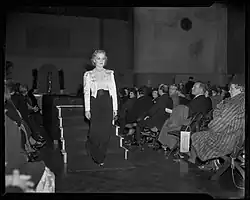 Diana Gibson models a cocktail suit