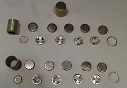 Three battery packs for the 1PN51, two of which are disassembled