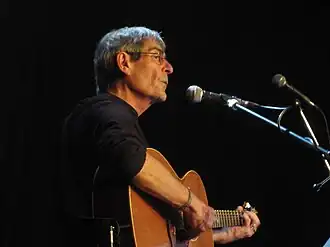 Yacoub performing in 2011