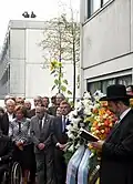 Commemoration ceremony of German and Israeli delegates with a wreath laying on 5 September 2012, under the watch of the German Police SEK positioned on the rooftop, in front of the Connollystraße 31 building