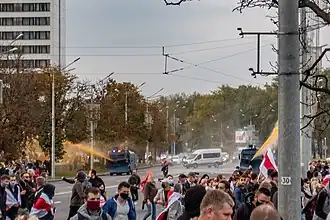 Use of water cannons in Minsk, 4 October. Note the orange color of the water: it makes visible traces on clothes[317]