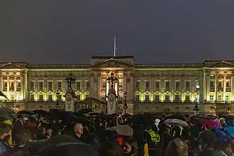 Crowds at Buckingham Palace following the death and state funeral of Elizabeth II, shortly after the Platinum Jubilee celebration which marked the 70th anniversary of her accession.