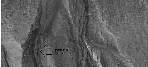 Close-up of gullies, as seen by HiRISE under HiWish program. Streamlined features in the channels are suggestive of a formation by running water. Location is Diacria quadrangle.
