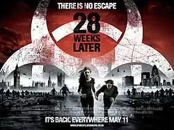 Two young figures fleeing from a horde of infected from London with a group of helicopters in the background with a large white biohazard warning symbol and the film's title above.