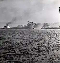 Photograph of Carl D. Bradley unloading