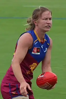Campbell running with a football