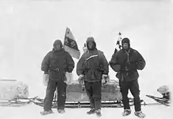 Members of the Discovery Expedition wearing thick fur mittens (1902)