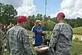 A member of Team USA loading his blackpowder rifle