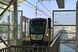 A train of Zhengzhou Metro Chengjiao line approaching the station