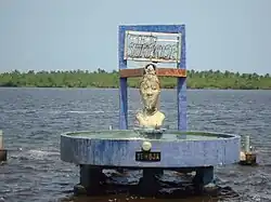 A statue of Yemaya above water
