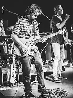 Dugan on-stage with Matisyahu during the Connection Festival in Jacksonville, Florida on July 25, 2015