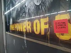 photo of mono color black on red print sticker on larger light box