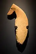 The head and body of a Saluki is made of stone from the Al-Magar civilization, in the Neolithic period (about 8000 BC)