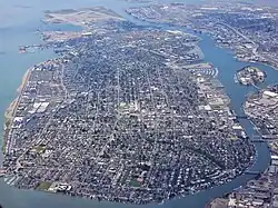 An aerial photo of Alameda Island from the southeast looking along its length to the northwest.