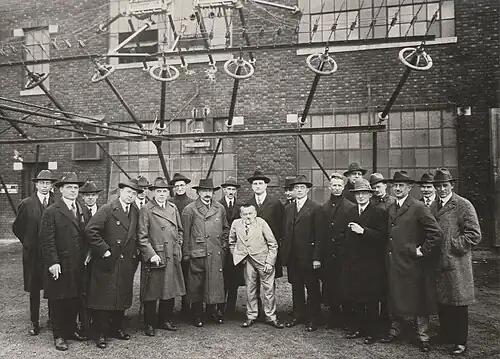 Image 10Early pioneers of radio science and technology in the United States, including Charles Steinmetz, David Sarnoff, Irving Langmuir, and Alfred Goldsmith in 1921, photographed next to the antenna feed wires of the New Brunswick Marconi Station, one of the first transatlantic radio links. The photo includes Albert Einstein as a visiting guest. (from History of radio)