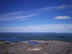 Northwest view from Ampersand of Middle Saranac Lake (left), with Weller Pond directly above. Upper Saranac Lake is just visible at top, and Lower Saranac Lake at far right.
