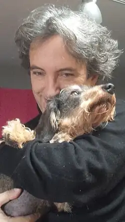 Andrea Liberovici with his dog.