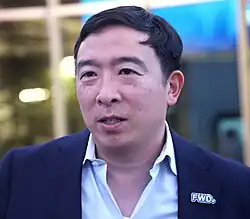 Andrew Yang speaking at an event