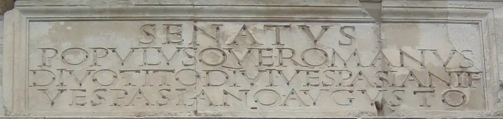 The SPQR inscriptional capitals on the Arch of Titus,  AD 81, are an example of inscriptional lettering which would have been infilled with bronze. Note the holes for the "tangs" of the cast bronze letters.
