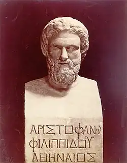 A Bust of Aristophanes in the Uffizi Gallery, Florence, Italy, with Greek writing on the base then curving up to the head