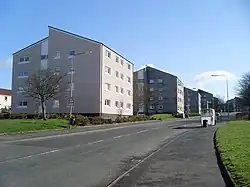 Summerston Railway Station with the step going up from the pavement.