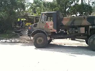 An Australian Army truck assisting with the cleanup of a flood affected suburb of Brisbane