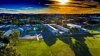 Aerial photo of the grounds of Aviation State High facing west (eastern courts at bottom of photo)