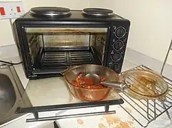 A bachelor griller, with cooking stains