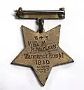 New Zealand Registered Nurse qualification badge presented to Nurse Vida M K MacLean, 1910 (back).