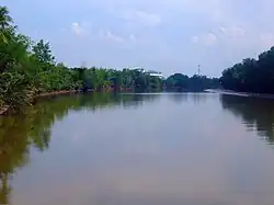 The Bang Pakong River at the point where it confluences with Khlong Tha Lat, near the King Taksin Memorial in Pak Nam, Bang Khla