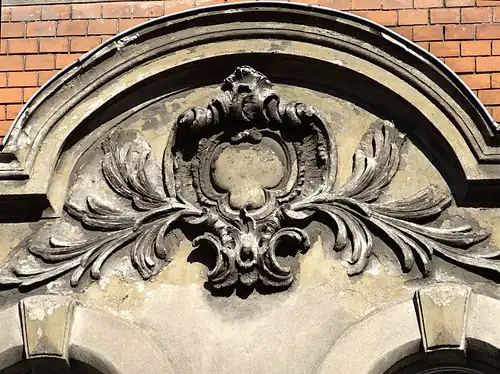 Adorned pediment