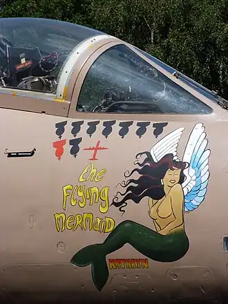 A Blackburn Buccaneer of the Royal Navy (RN) of the United Kingdom with its nose art and victory markings.