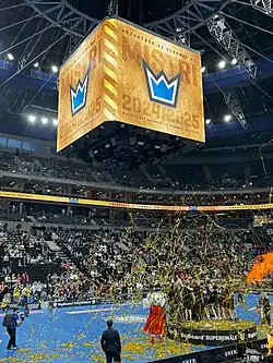 Men's team celebrating winning the title in the 2024–25 season