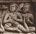 Hindu, Buddhist. 9th century AD, Borobudur (second gallery, main wall). Girl in a dance position playing a lute.