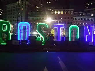 Boston City Hall Plaza lit up in Blue and Green for 10th Annual Boston GreenFest