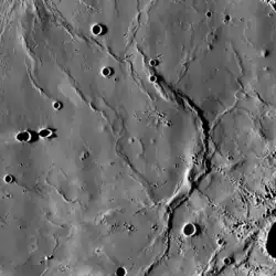 Dorsa Geikie is a prominent wrinkle ridge in Mare Fecunditatis. LRO mosaic.