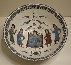 Enthroned figure flanked by attendants.[56]