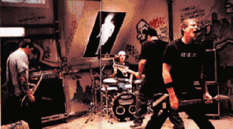 The group during the music video for "I Feel So". Left to Right : David Kennedy, Travis Barker, Anthony Celestino, Tom DeLonge